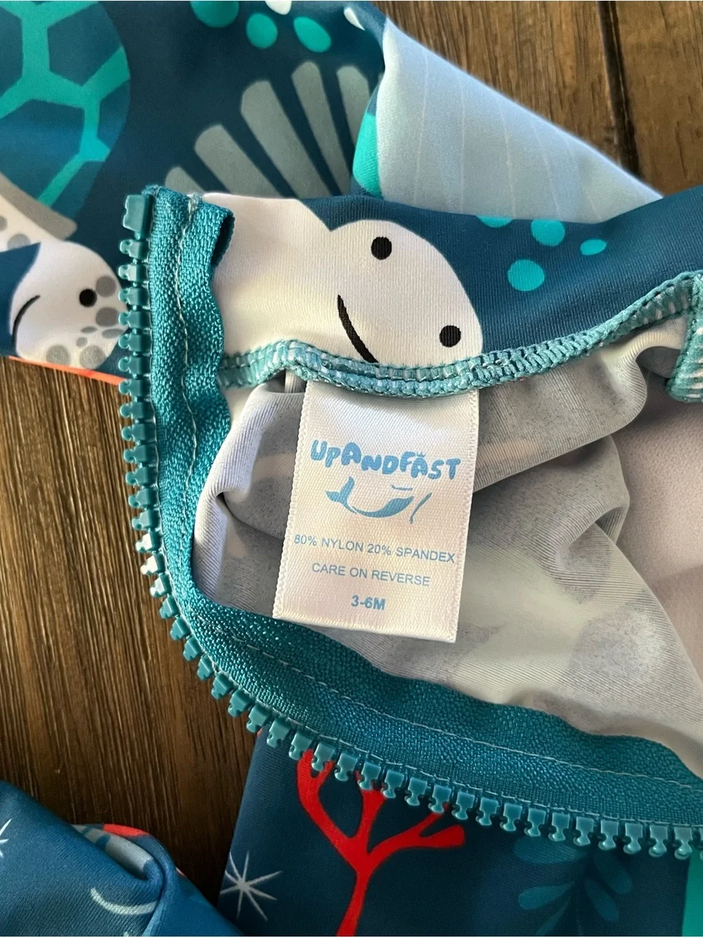 Upandfast Long-Sleeve Swimsuit w/hat in Navy Ocean Print infant size 3-6mo